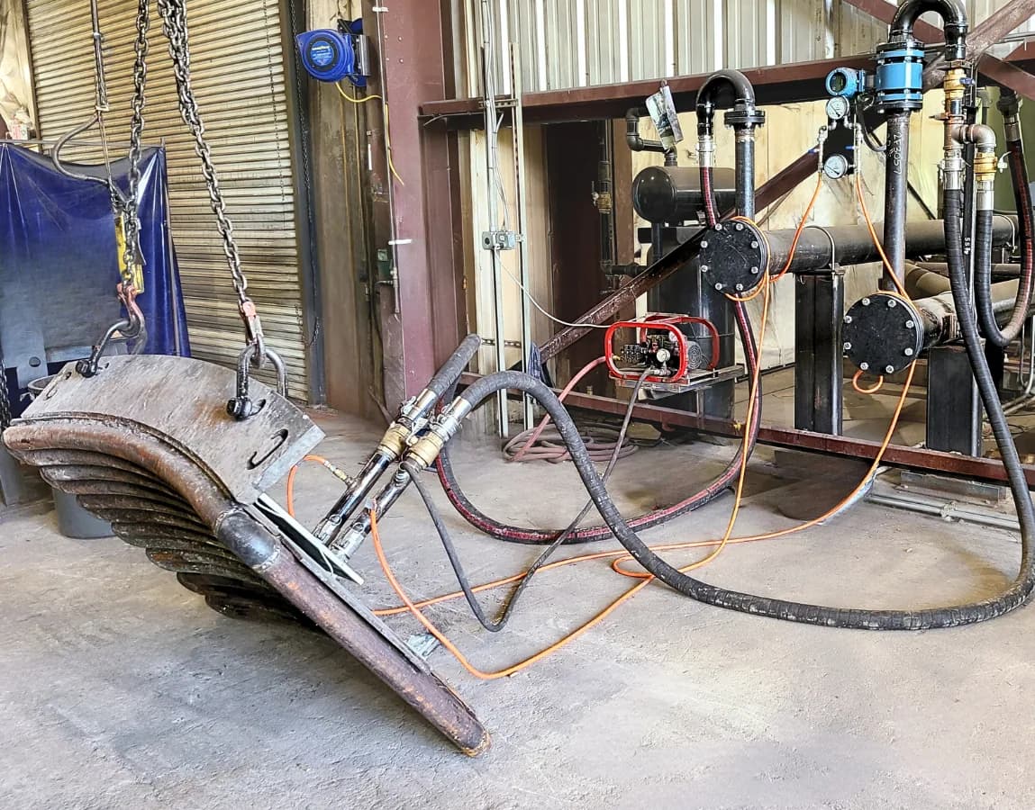 Field service technician performing emergency melt shop repair